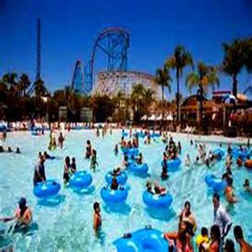 Hurricane Harbor pool with people and inner tubes